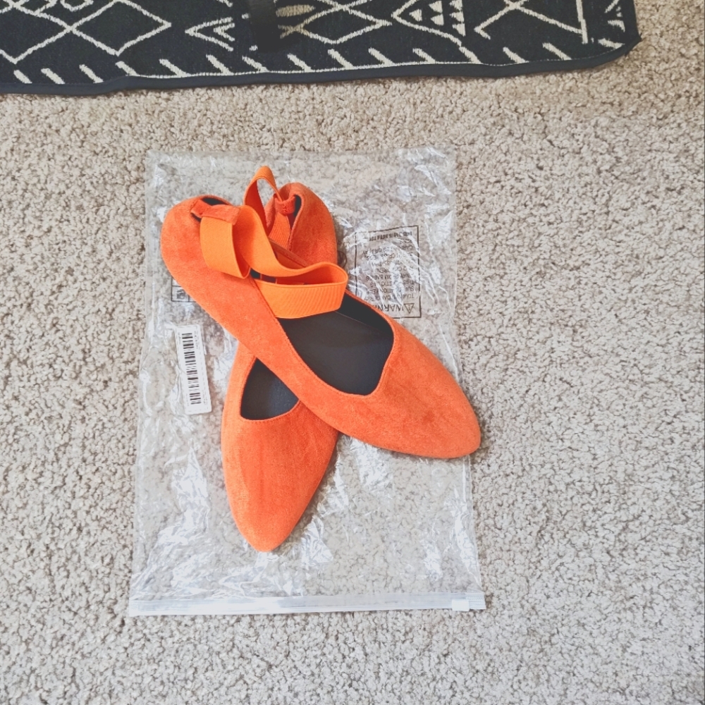 Orange criss cross ankles shoes